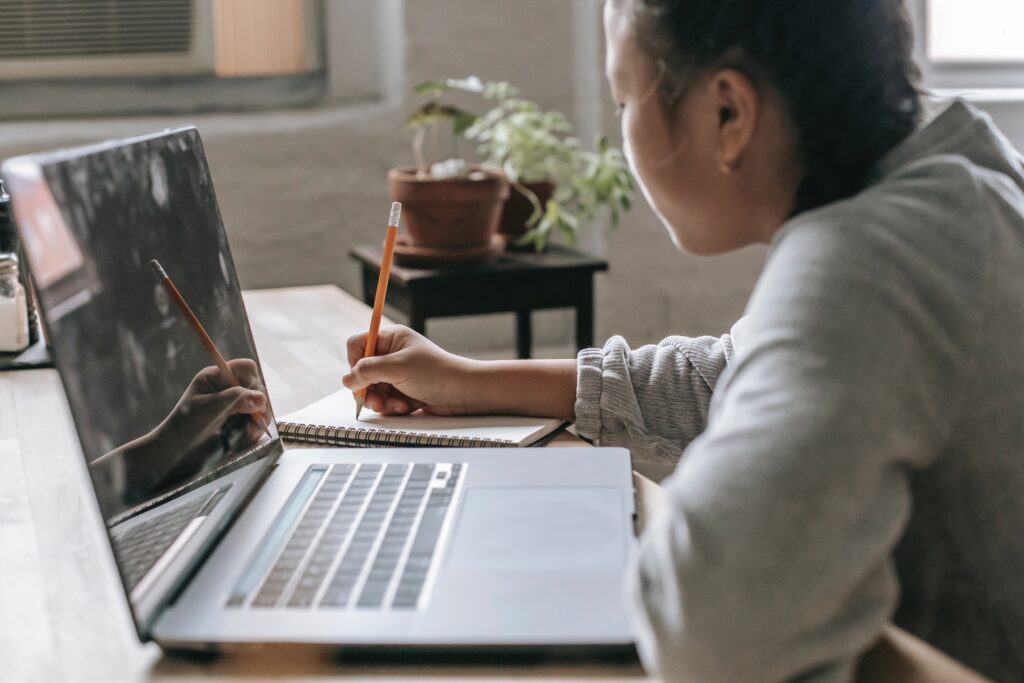 Person working at a laptop.